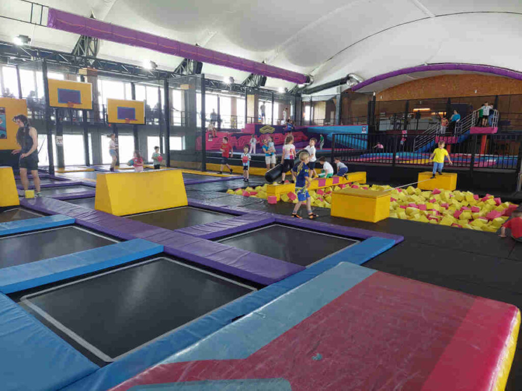 Around the trampoline park there are tables where parents can have a drink and watch their children play