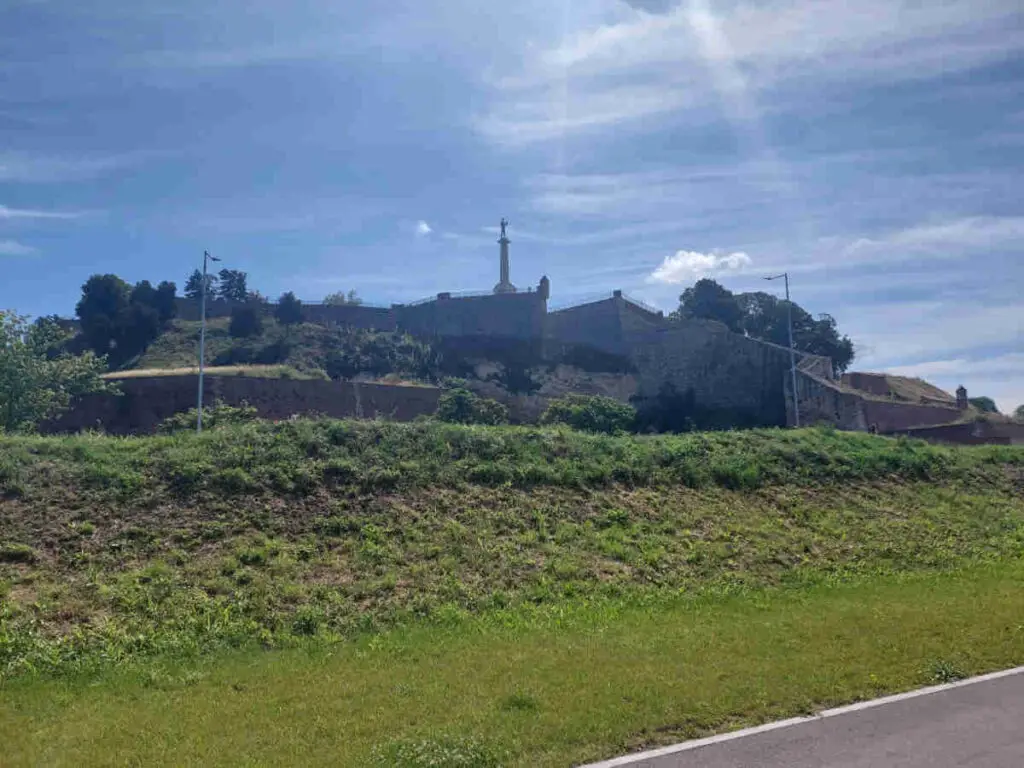 The Victor Monument as seen from the river promenade beneath the Fortress