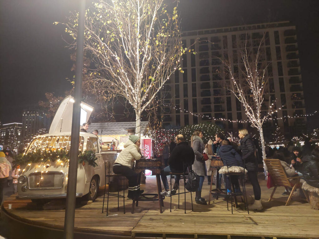 People having a drink at Belgrade Christmas market