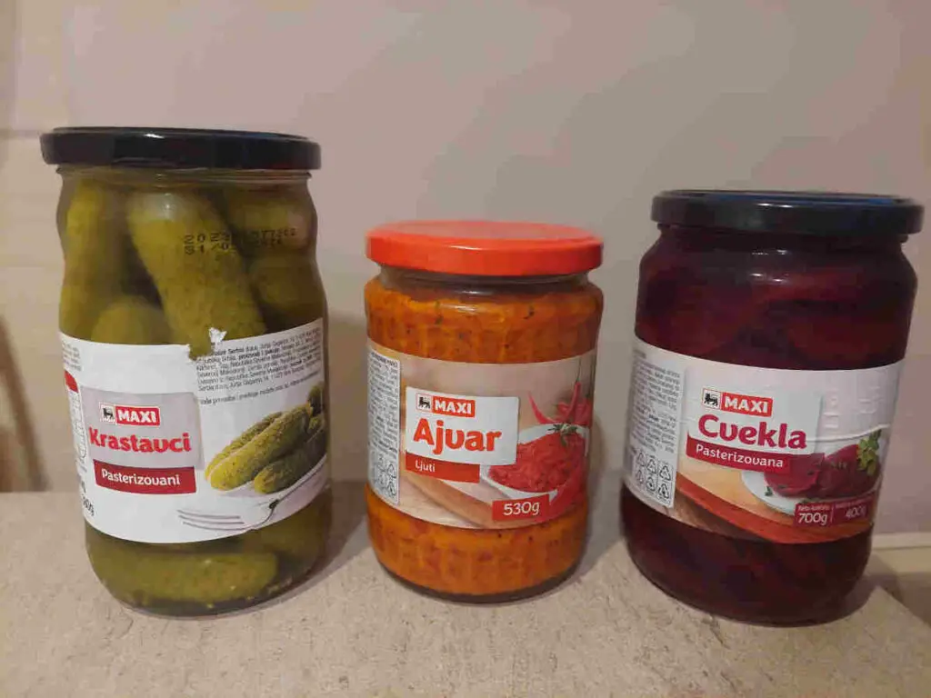 Store-bought winter preserves: pickles, ajvar and beetroot.